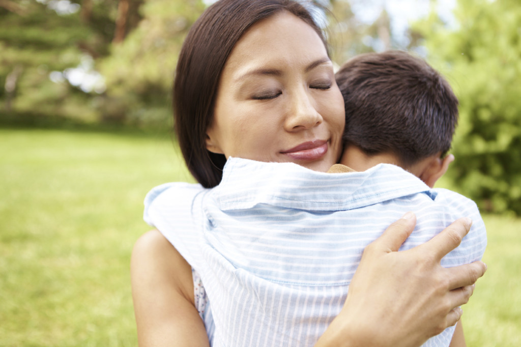 Mom-holding-child.jpg